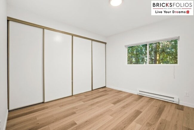 Building Photo - Live Steps from Microsoft | Stylish 2BR Condo with Fireplace & Parking