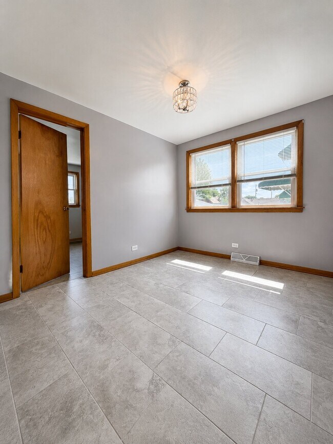 Building Photo - 11251 S Ave L