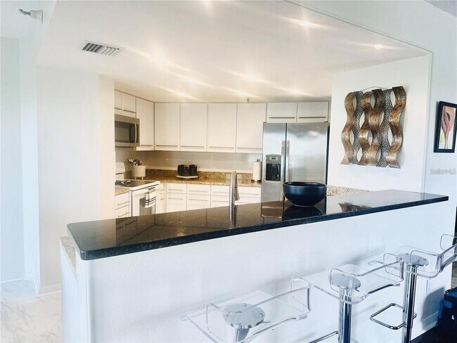 Building Photo - 5950 Pelican Bay Plaza S