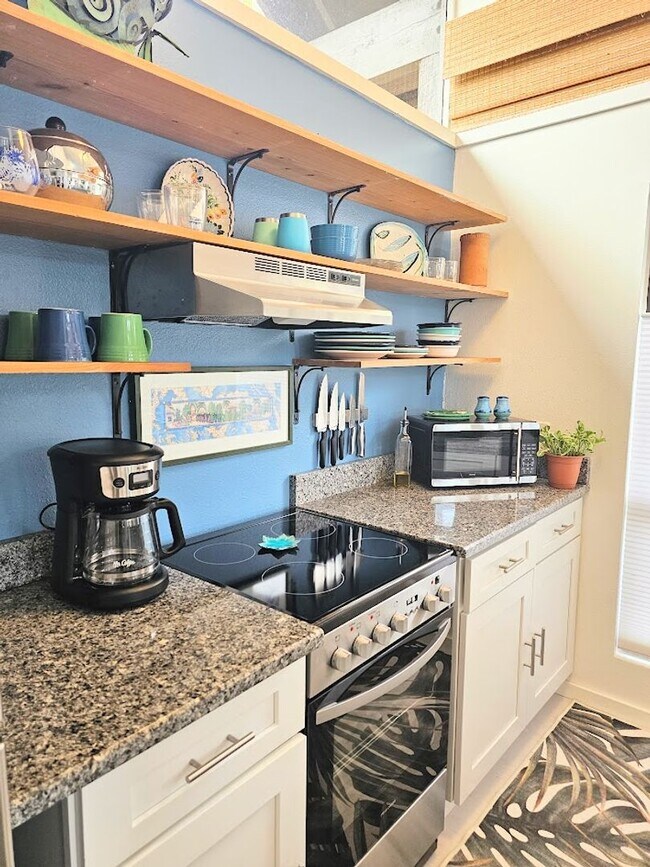 Building Photo - Furnished Waterfront Bungalow with Pool Ac...