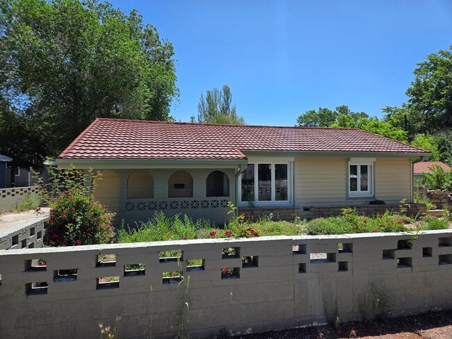 Building Photo - COMING IN JULY! Spacious 4-Bedroom Home in...
