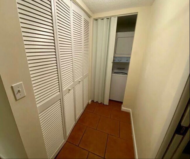 Stack washer dryer in hallway - 600 Egret Cir