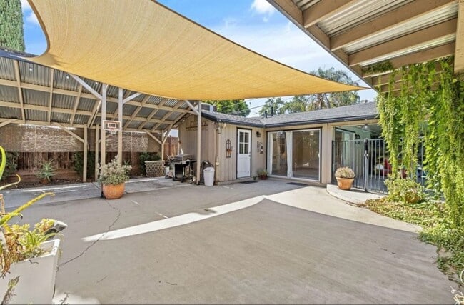 Building Photo - Beautiful home with Studio coming soon!