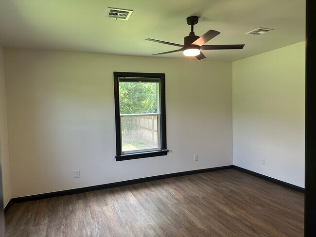 Building Photo - Welcome to country living with a fresh, modern twist.