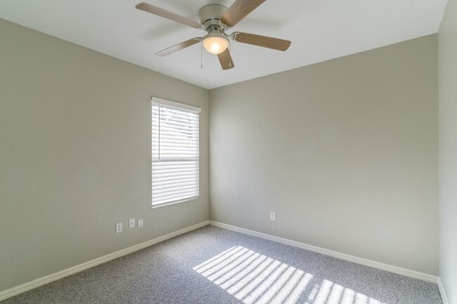 Building Photo - Beautiful 4/2 home Located on a tree lined street in the gate of country club community of the Hu...