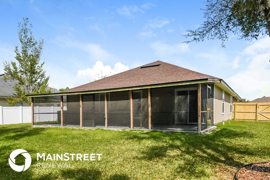 Building Photo - 7104 Rapid River Dr W