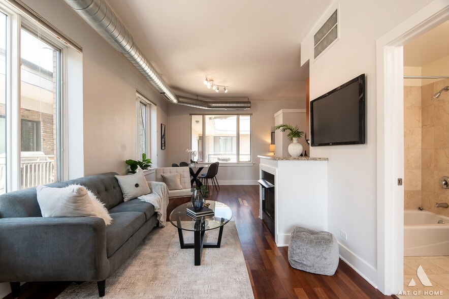 Living Room with Fireplace - 4751 N Artesian Ave #409