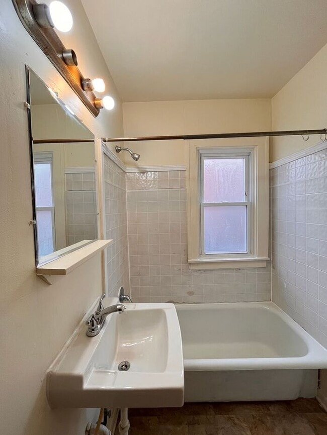 Building Photo - Cozy and Bright 2-Bedroom Duplex with Fire...