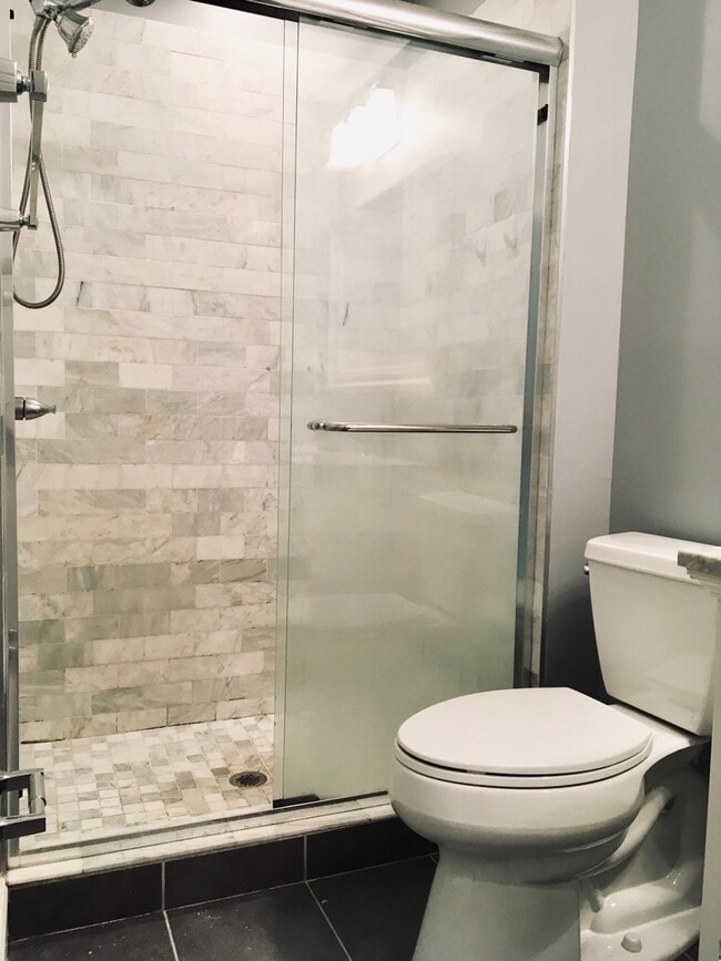 Building Photo - Charming 2 Bedroom/3 Bathroom Townhome w/ Den and In-Unit Laundry in Locust Point, MD! - Parking ...