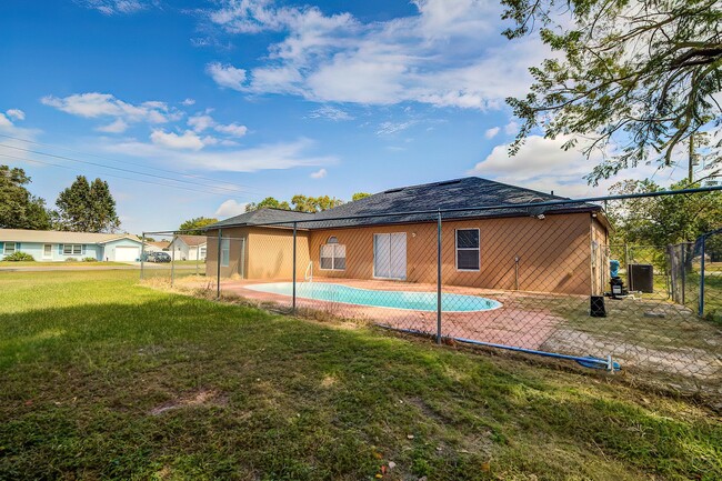 Building Photo - 4-bedroom, 2-bathroom POOL home