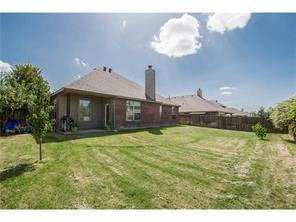 Building Photo - Former model home on corner lot is ready for move in!