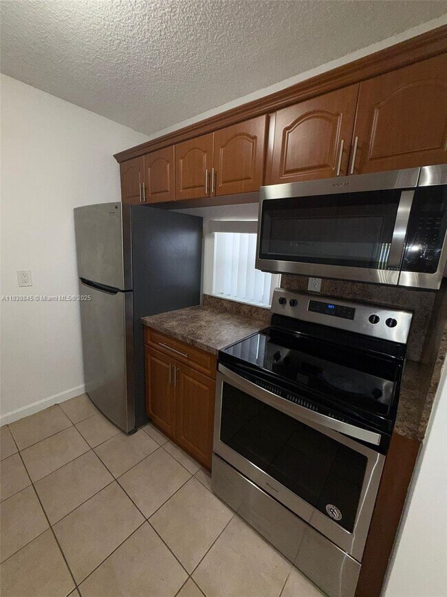 Building Photo - 8560 N Sherman Cir