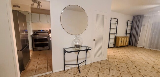 View from front door into Dining Room and Living Room. The kitchen is to the left in photo. - 3 Island Ave