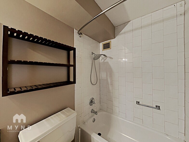 Building Photo - 7020 E Girard Ave