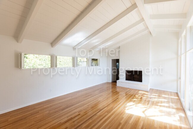 Building Photo - Charming Mid-Century Home | 4BR, 3BA | 2,4...