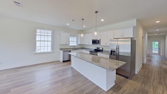 Building Photo - New build! 3/2 with backyard storage shed