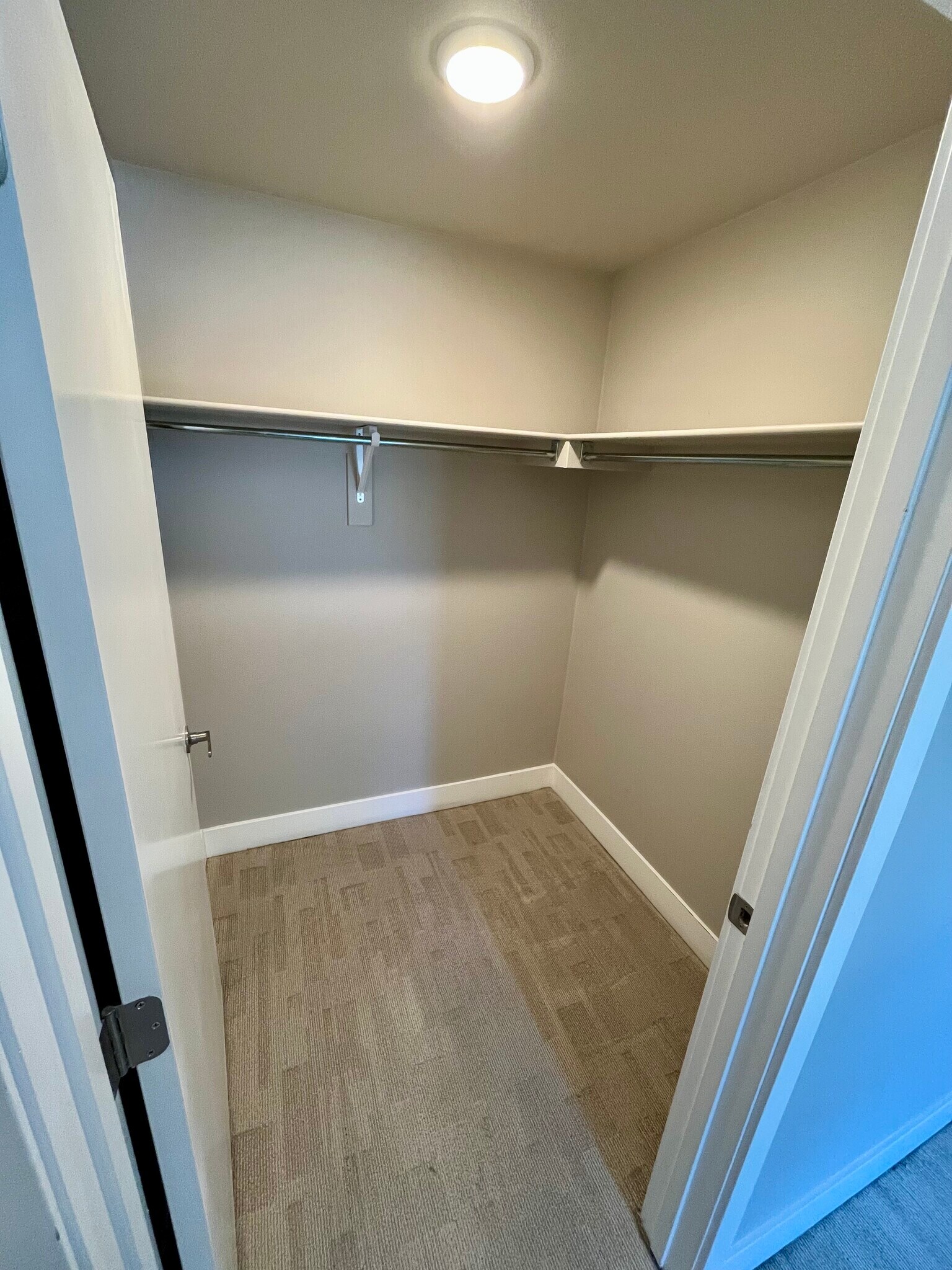 Primary bedroom walk-in closet - 2374 S University Blvd
