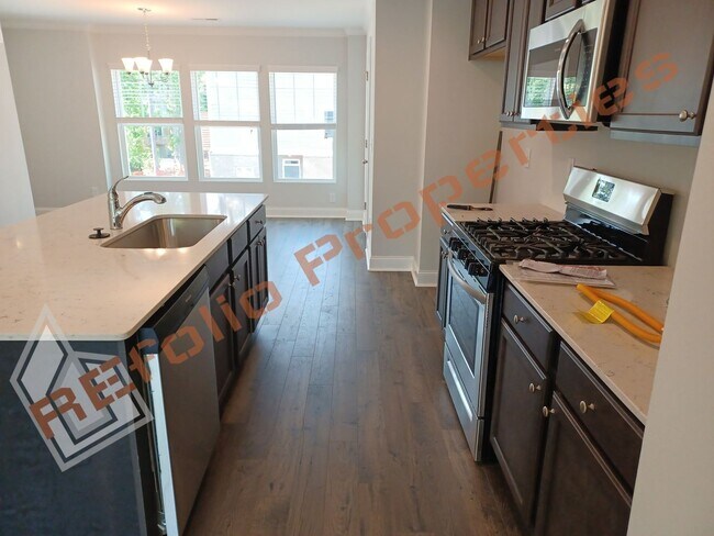 Building Photo - Built in 2022! 3 Story 3 Bedroom 1-Car Gar...