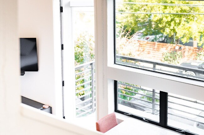 Building Photo - Stylish Furnished Loft Steps from Downtown