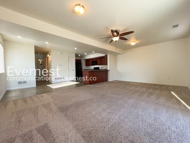 Building Photo - 4 Bed, 4 Bath Townhome with Fenced Yard & Garage / Available Soon!
