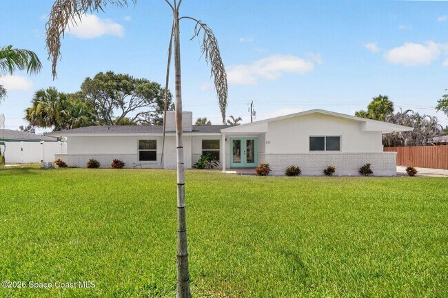 Building Photo - Welcome to this beautifully remodeled 4-bedroom, 3-bath home in the heart of Indialantic Beach!