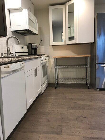 MODERN GRANITE KITCHEN WITH MOVING ISLANDS - 3412 177th Pl SW