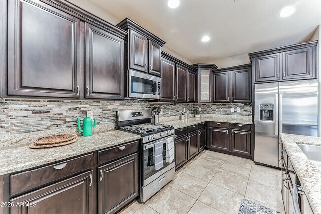 Building Photo - 7657 S Debra Dr