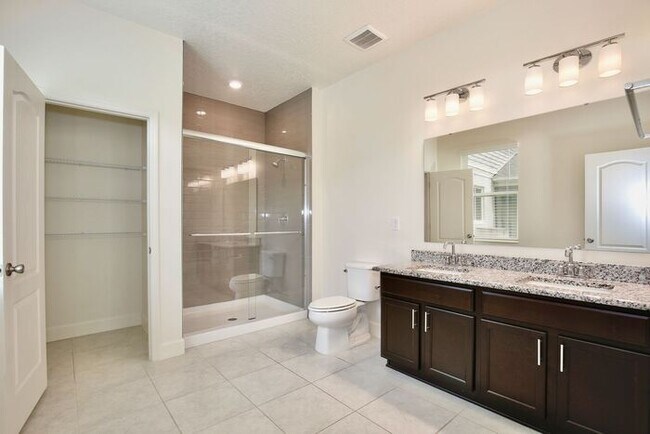 Building Photo - Gorgeous 4/3 Spacious Home with a 2 Car Garage Located on a Conservation Lot in Creekstone Neighb...