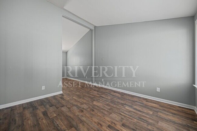 Building Photo - A Must See/ High Vaulted ceiling's & Section 8 Welcome!!!