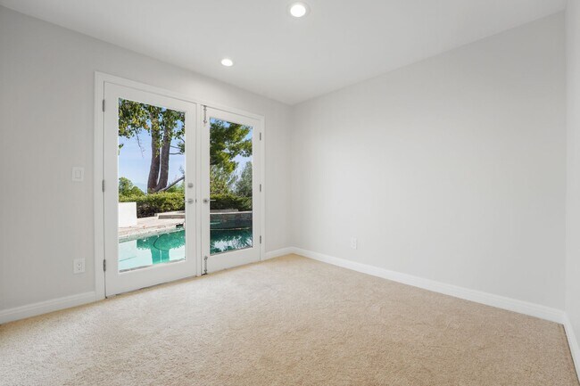 Building Photo - This stunning 5 Bed / 3 Bath Home South of Ventura Boulevard with pool and panoramic views is now...