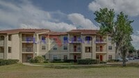 Building Photo - NICE!  2 BED / 2 BATH CONDO (ACROSS FROM C...