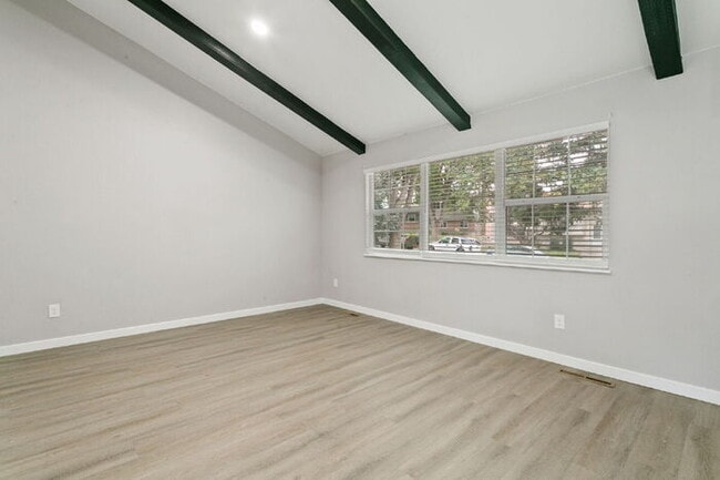 Building Photo - Freshly Renovated 4-Bedroom Home with Over...