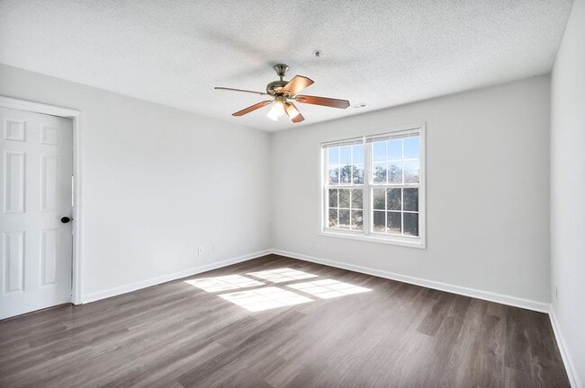 Building Photo - RENT SPECIAL! Freshly Painted! New Luxury ...