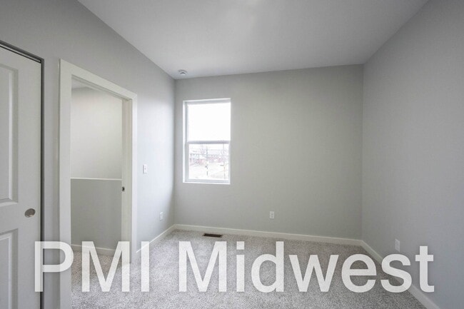 Building Photo - "Charming 2-Bedroom Gem with 1.5 Baths on East Michigan Street – A Cozy 949 Sq. Ft. Haven in Indi...