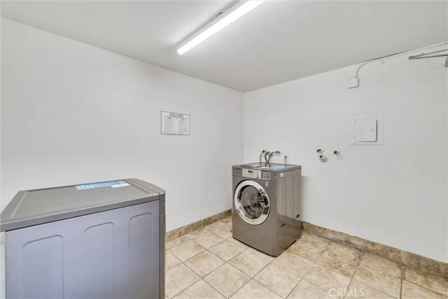 Laundry facilities directly below unit - 1301 Massachusetts Ave