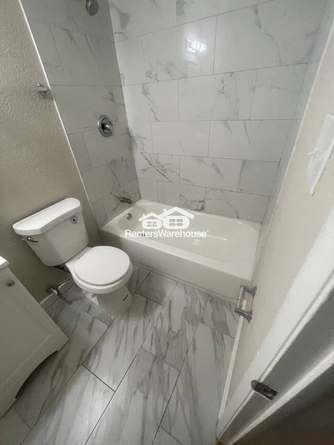 Building Photo - Updated 4-bedroom 2.5 bath home with finished basement