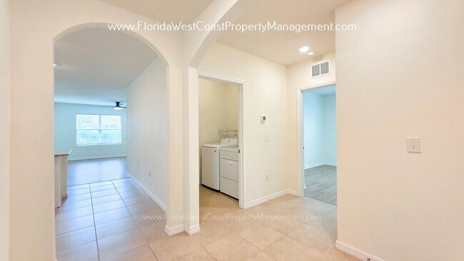 Building Photo - MOVE IN READY ! 4 BEDROOM/2 BATH! TILE- LVP THROUGHOUT! LAWN MOWING INCLUDED!
