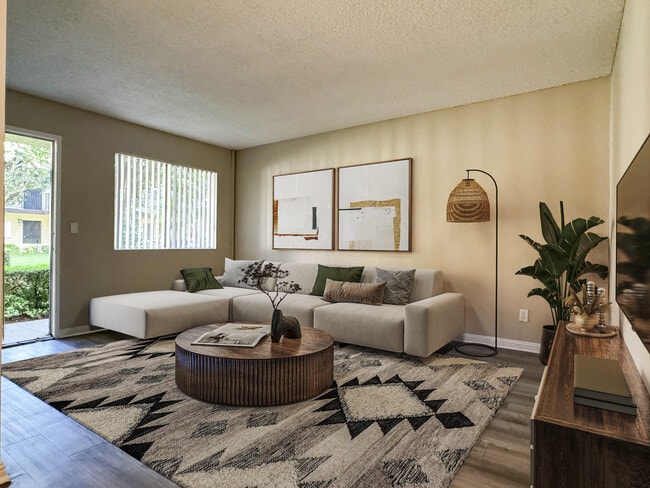 1 BR, 1 BA - Living Room - Orange Terrace Apartments