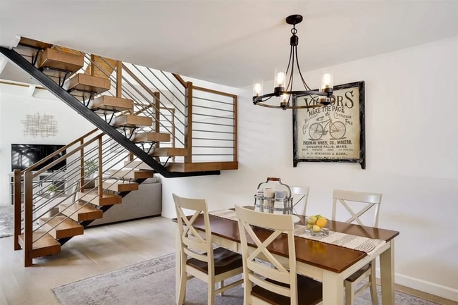 Building Photo - Spacious 1,550 Sq Ft Townhome | 2-Car Garage & High Ceilings w/ Exposed Beams