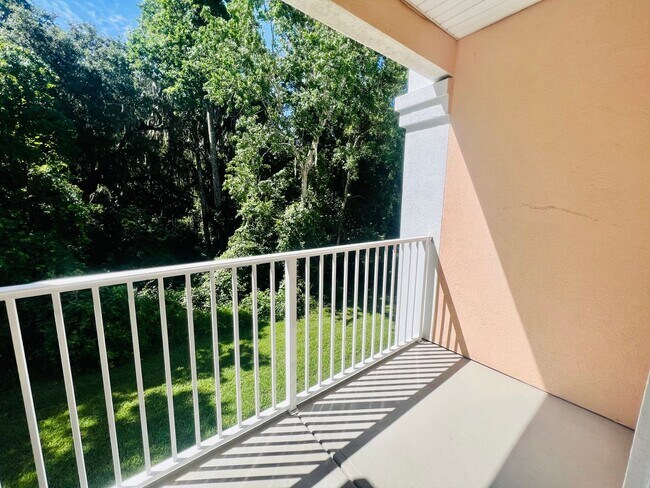 Building Photo - Stylish 3 Bedroom, 2 bath Condo with Woode...