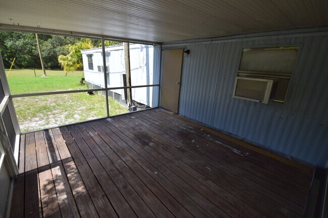 Building Photo - 2BR, 1BA Mobile Home with screened patio
