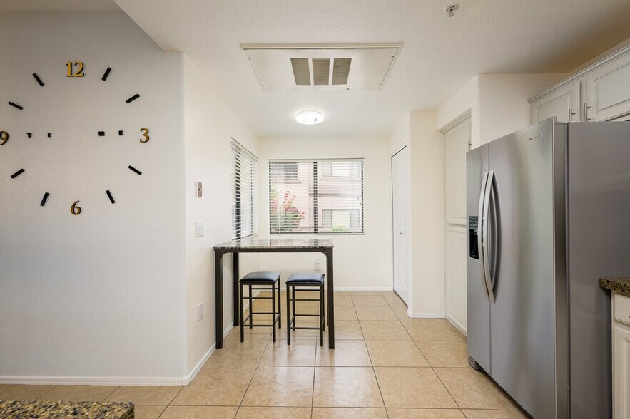 Building Photo - 9455 E Raintree Dr