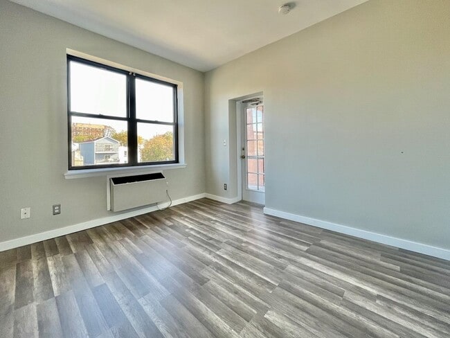 Building Photo - 43-49-49 Van Wagenen Ave
