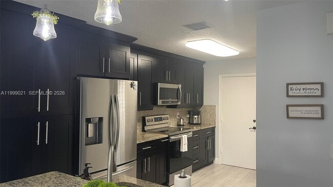 Building Photo - 10138 Royal Palm Blvd