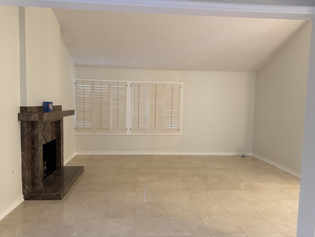 Plantation shutters in living room and dining room. - 3816 San Augustine Dr