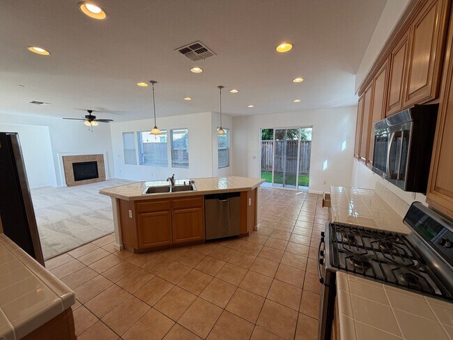 Building Photo - 4 bedroom | 2.5 bathroom | Single family home in West Sacramento's Bridgeway Lakes neighborhood