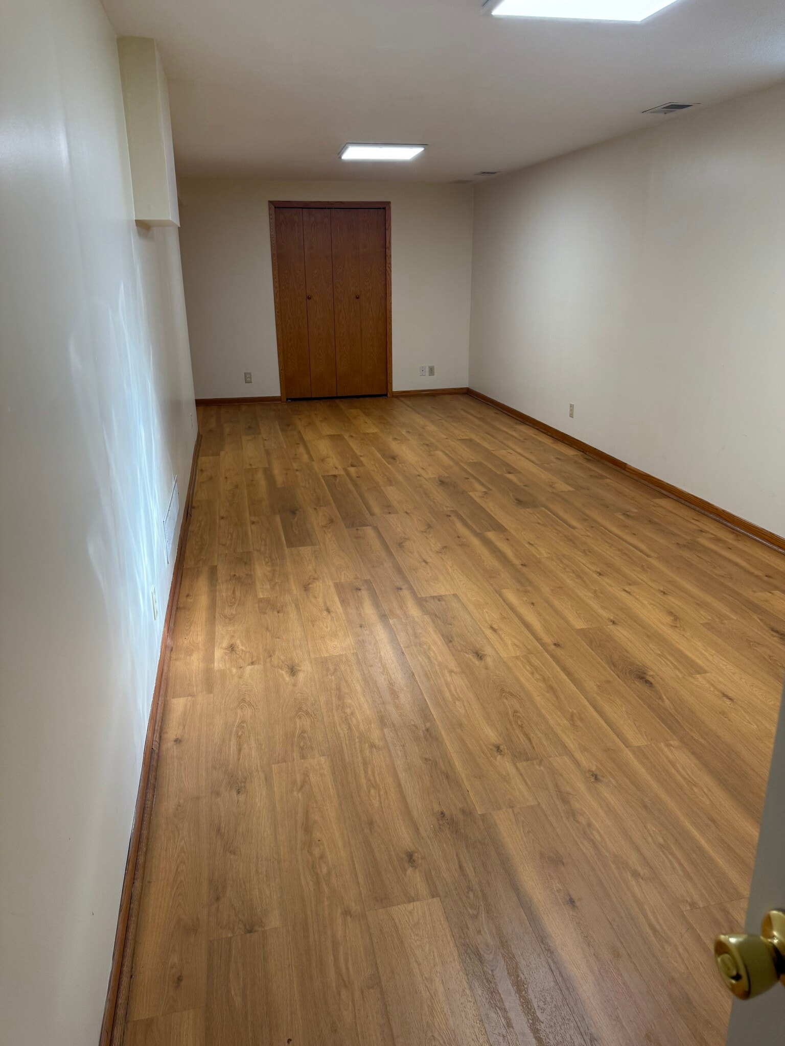 Living Room in Basement - 14707 Dominica Ct