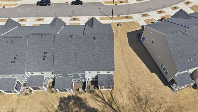 Building Photo - Upgraded 3BR Townhome in Wake Forest | Open Layout, Garage & Resort-Style Amenities