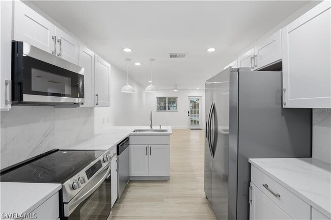 Building Photo - 7599 Winged Foot Dr