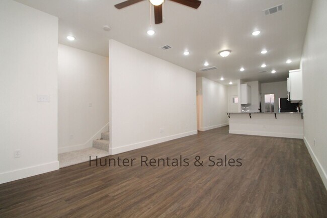 Building Photo - Upscale Four-Bedroom Townhome!